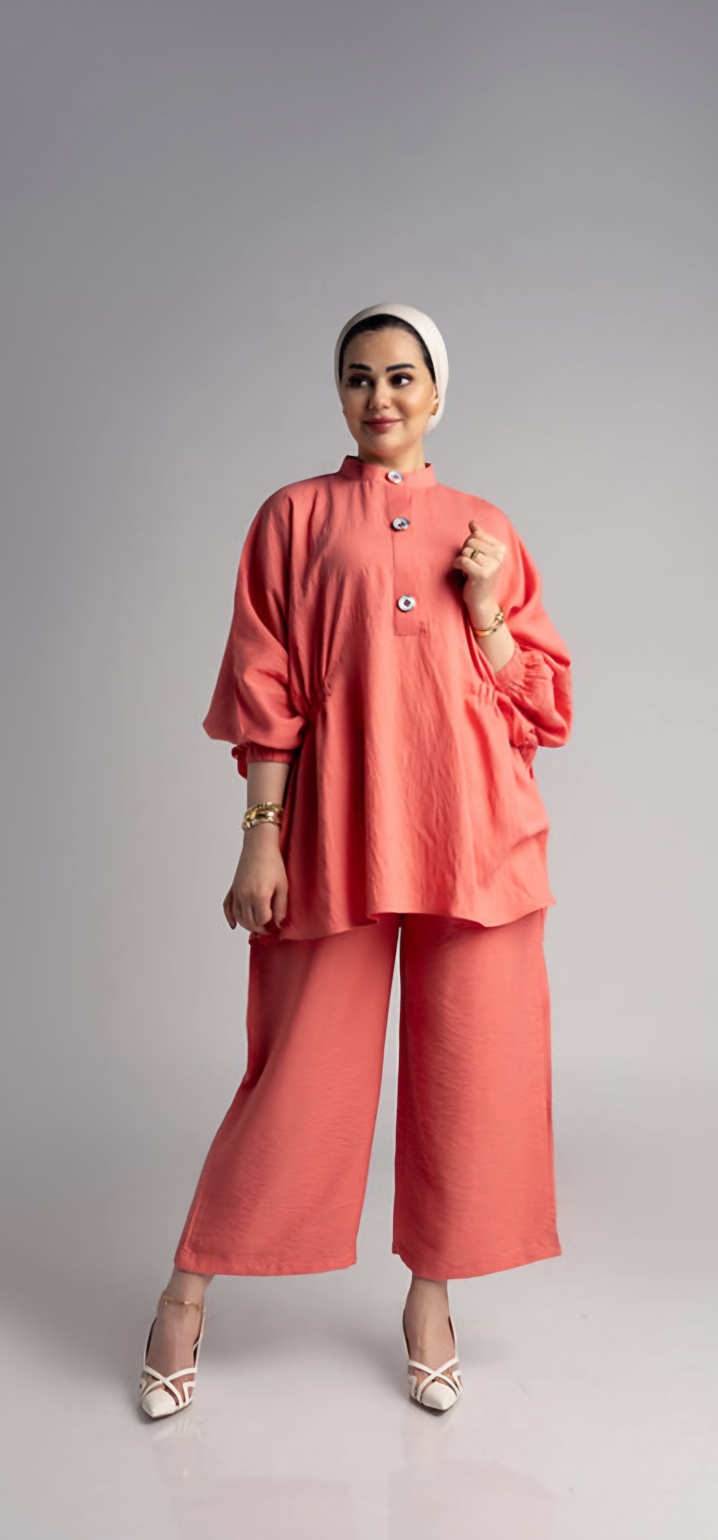 Two pieces of apricot-color suit by Lebsaty