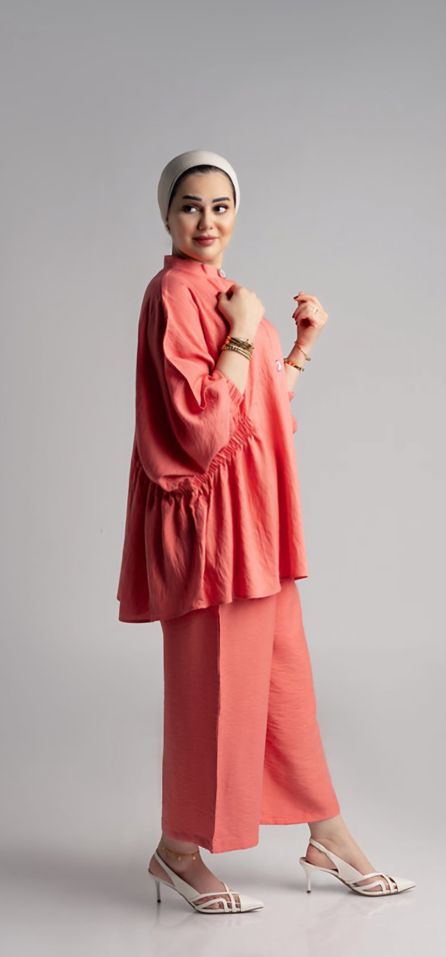 Two pieces of apricot-color suit by Lebsaty