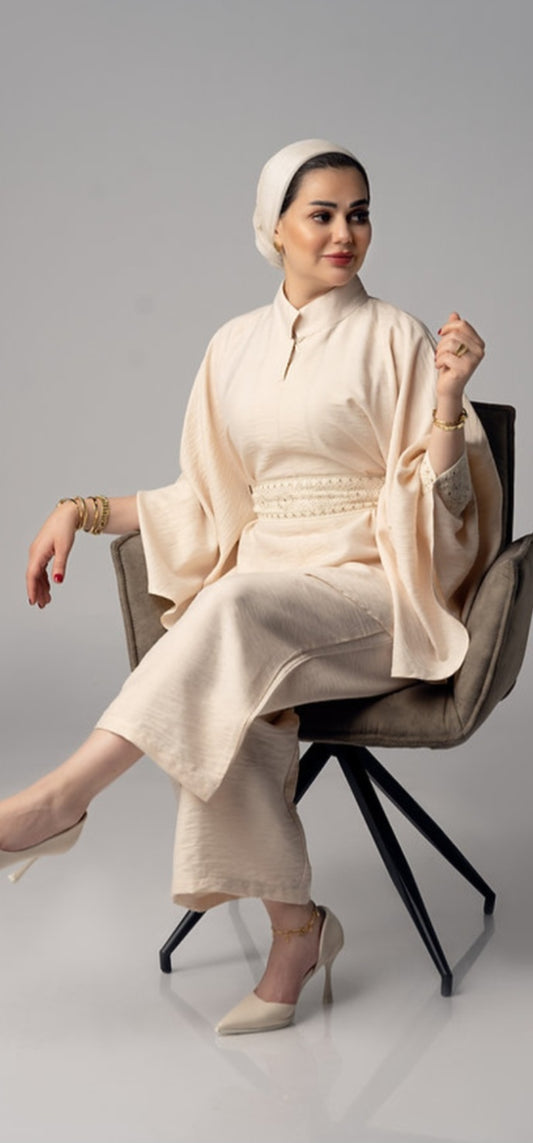 Women's beige suit by Lebsaty
